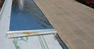 Radiant barrier and Ultra SA peel & stick underlayment under tile